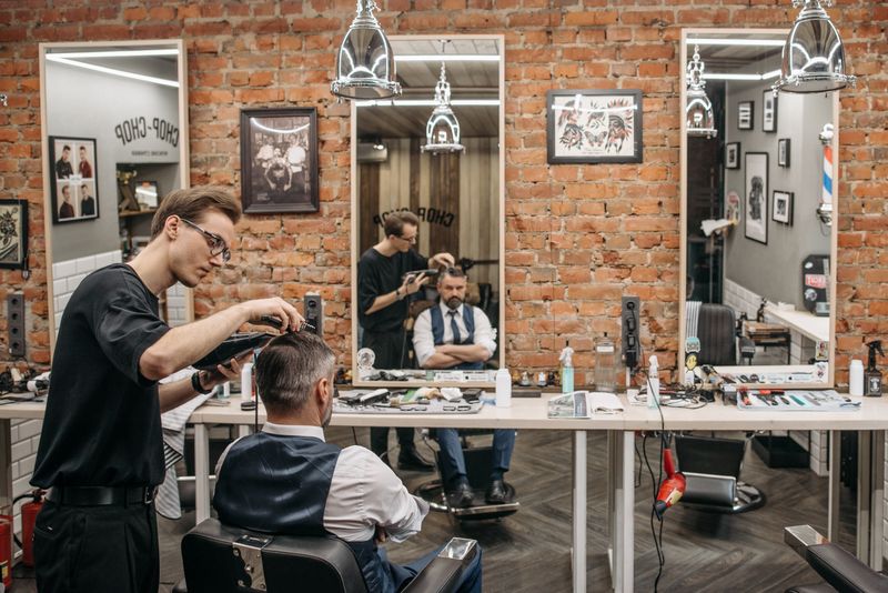 Salon owner arranging her studio before clients arrive